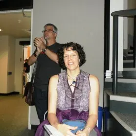 Panel Host and former Conference Organizer Nan Macy (with a slightly known writer seen in the background).