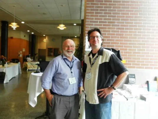 I stopped to take a totally un-posed pic of Chuck Robinson and Paul Hanson of Village Books. We might need a calendar if this keeps up!
